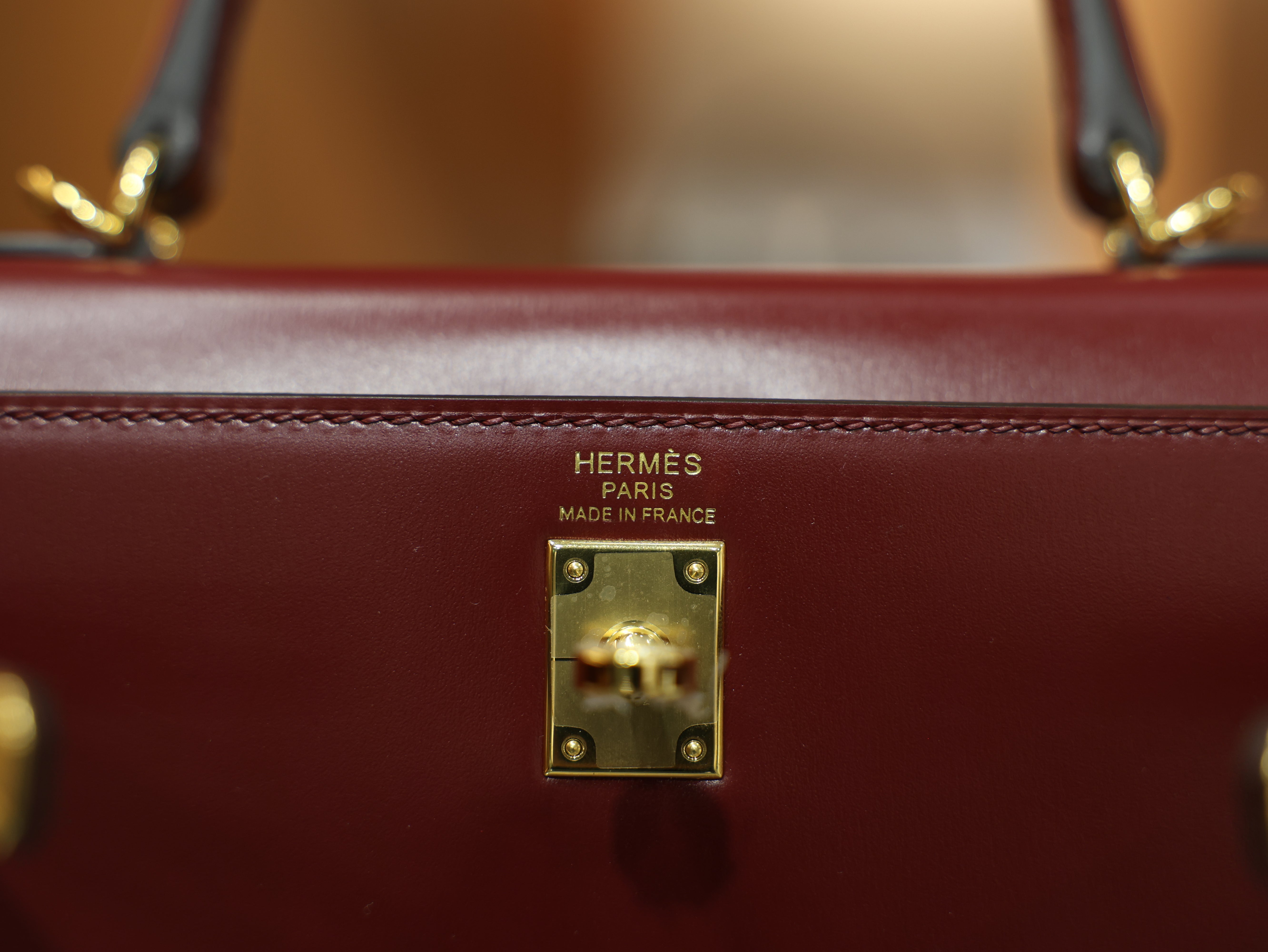 kelly 25 box sellier rouge H GHW