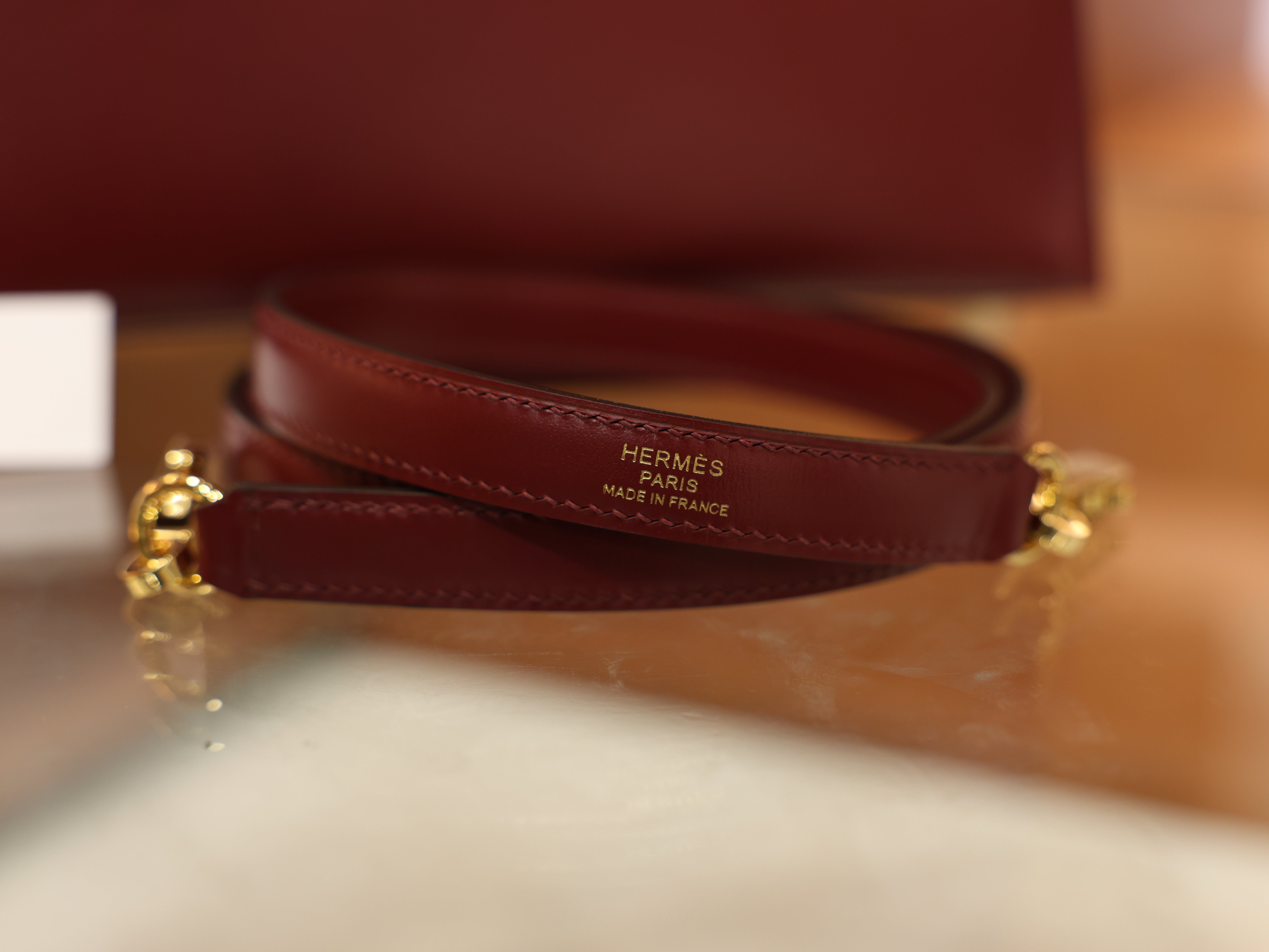 kelly 25 box sellier rouge H GHW