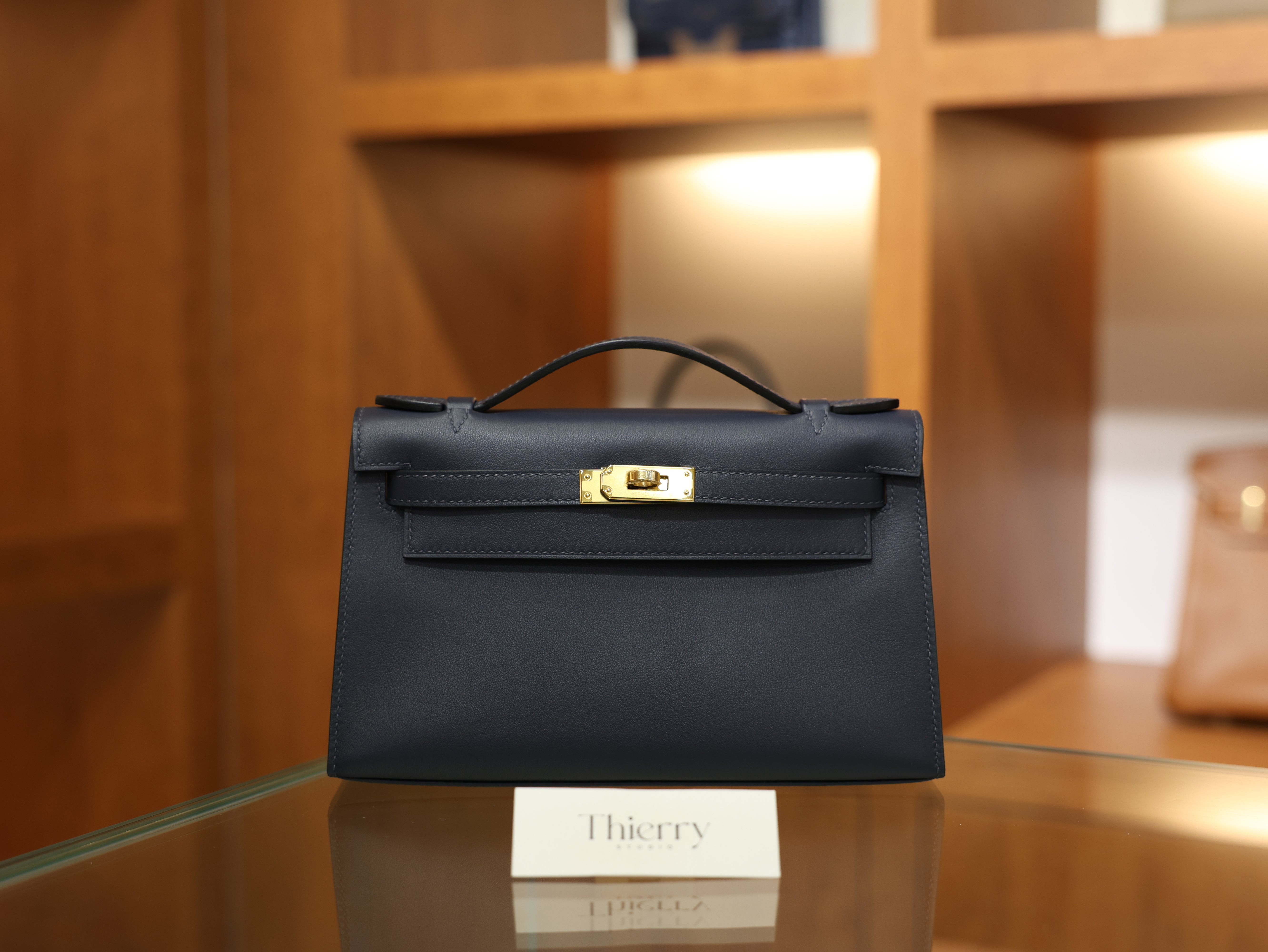 Kelly pochette swift blue nuit GHW