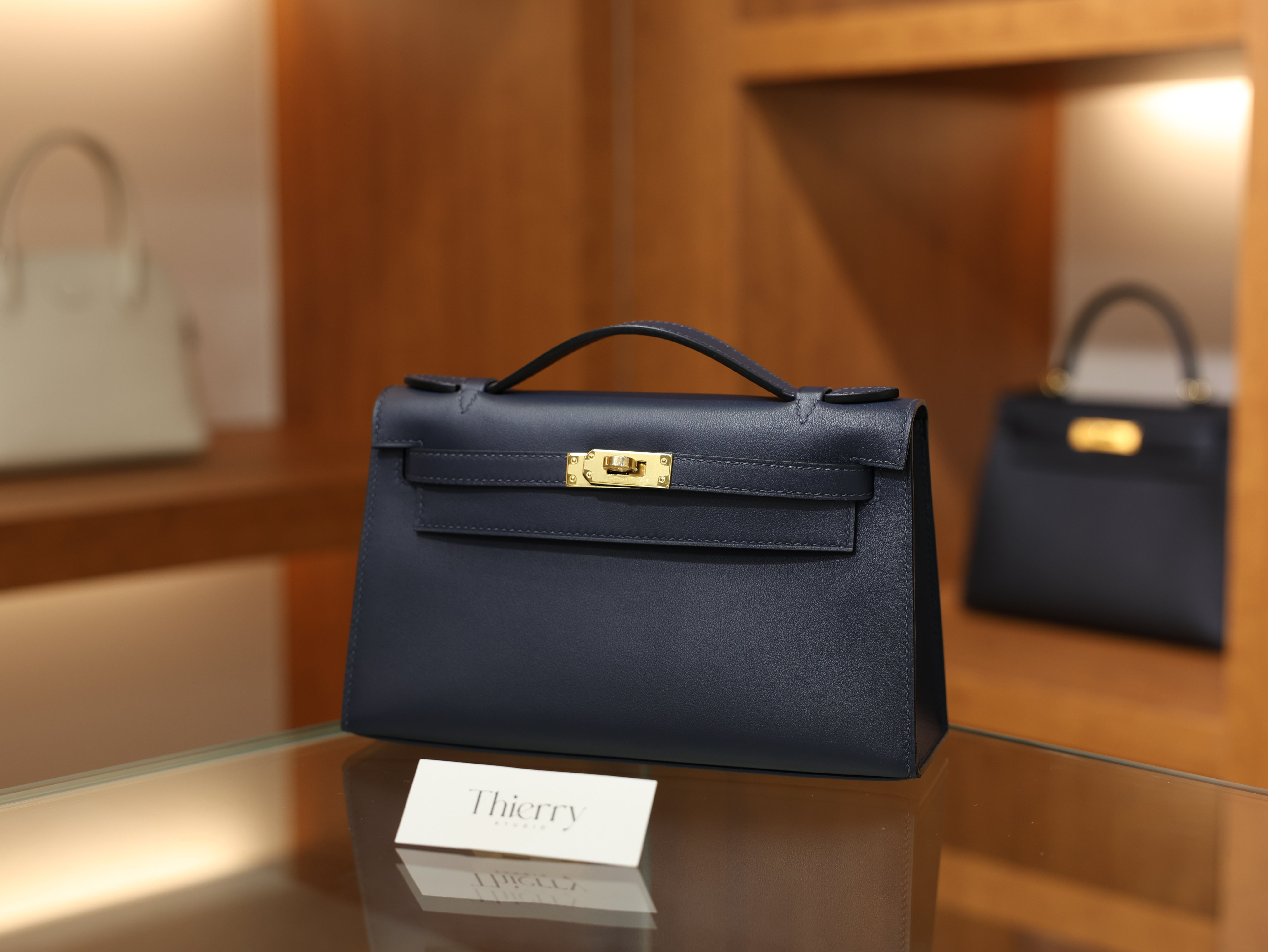 Kelly pochette swift blue nuit GHW