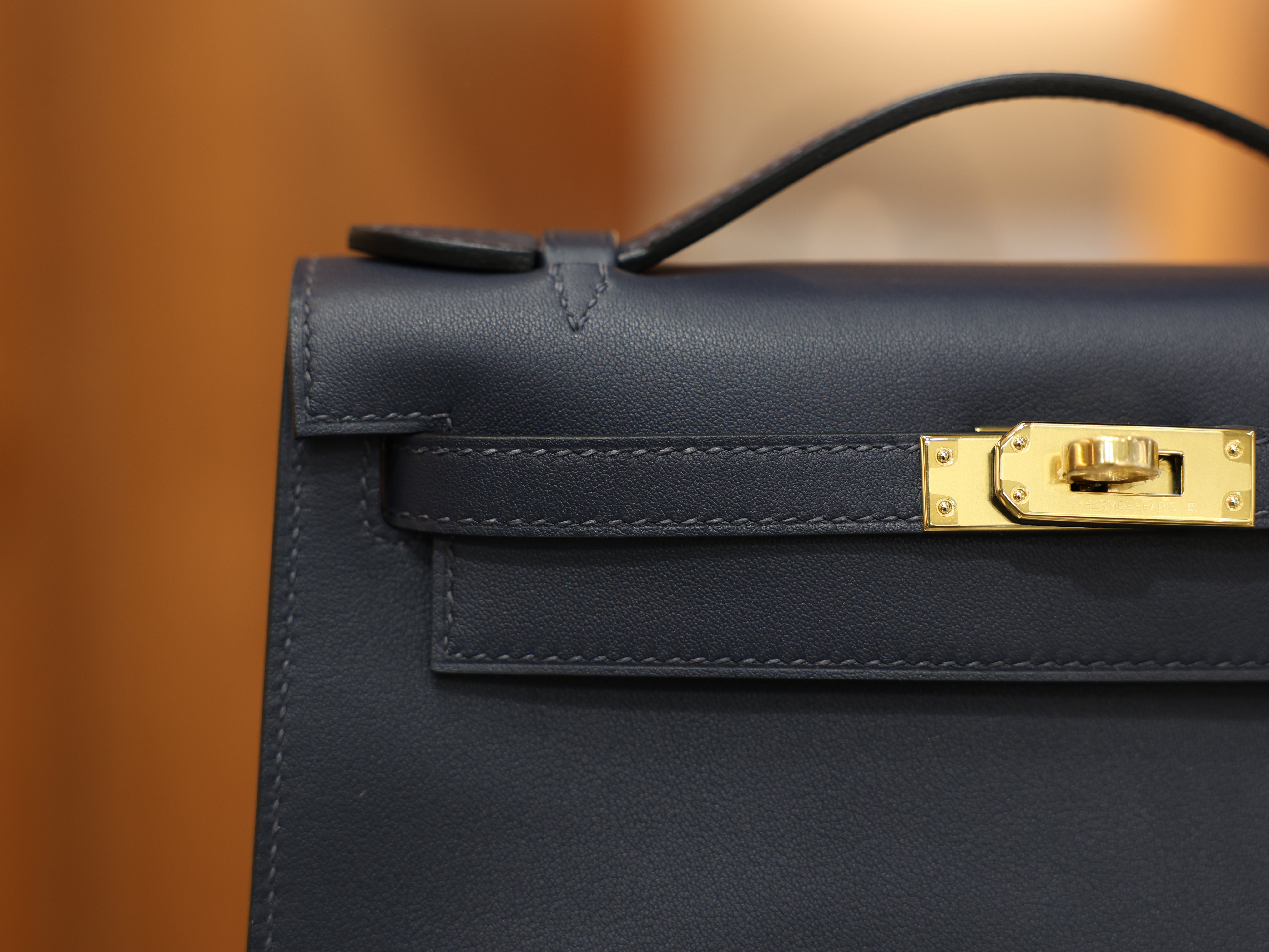 Kelly pochette swift blue nuit GHW