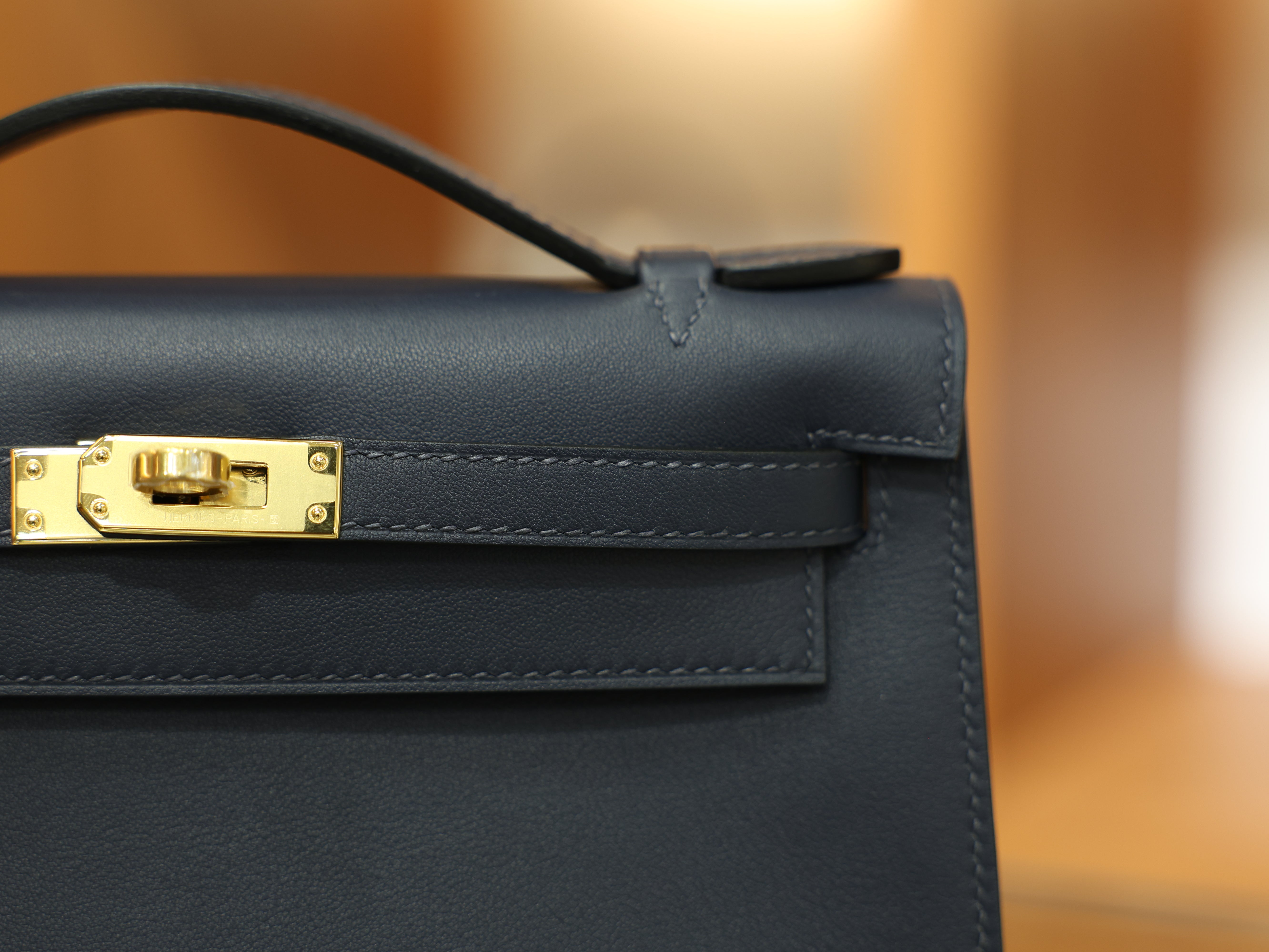 Kelly pochette swift blue nuit GHW