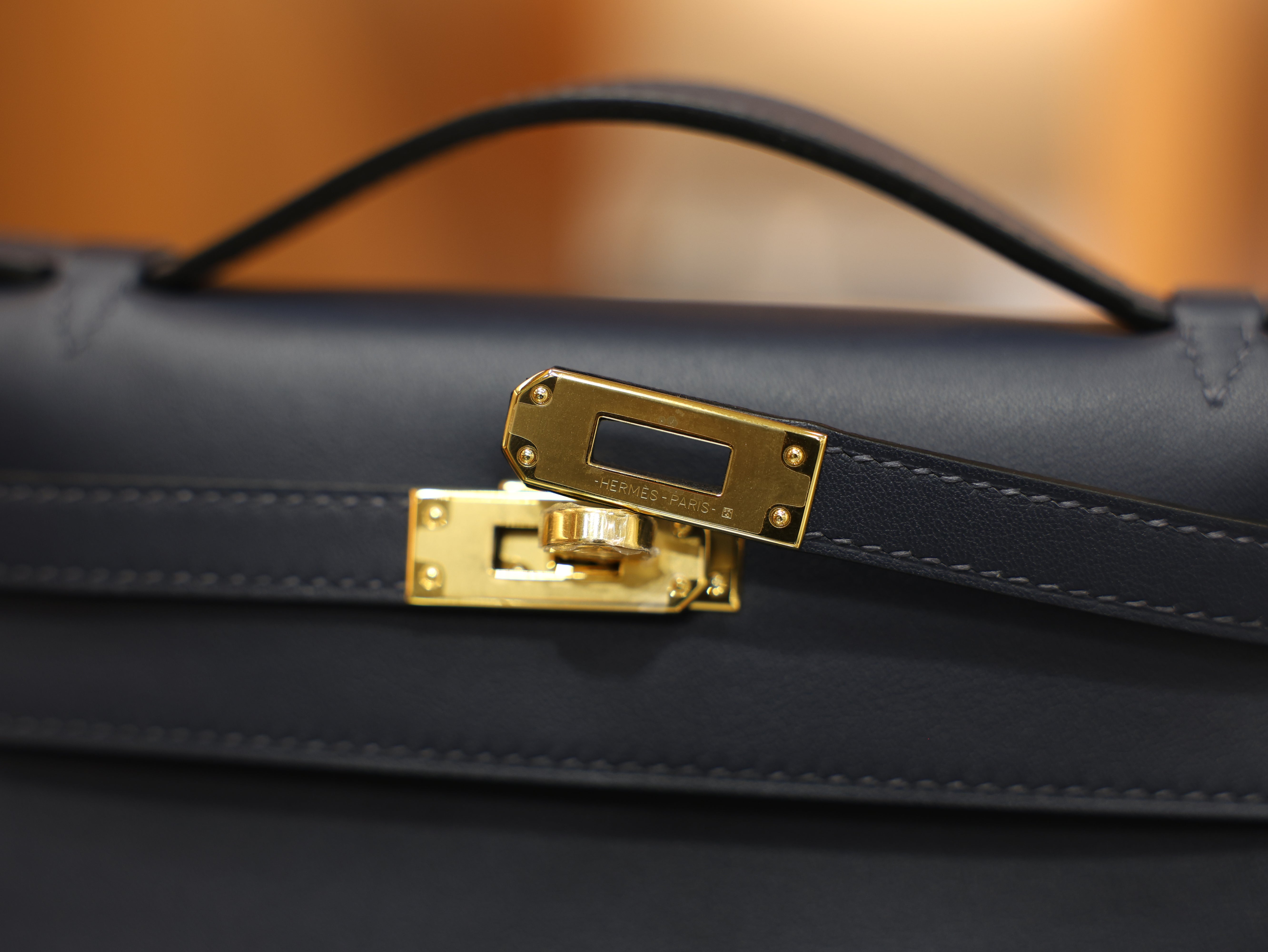 Kelly pochette swift blue nuit GHW