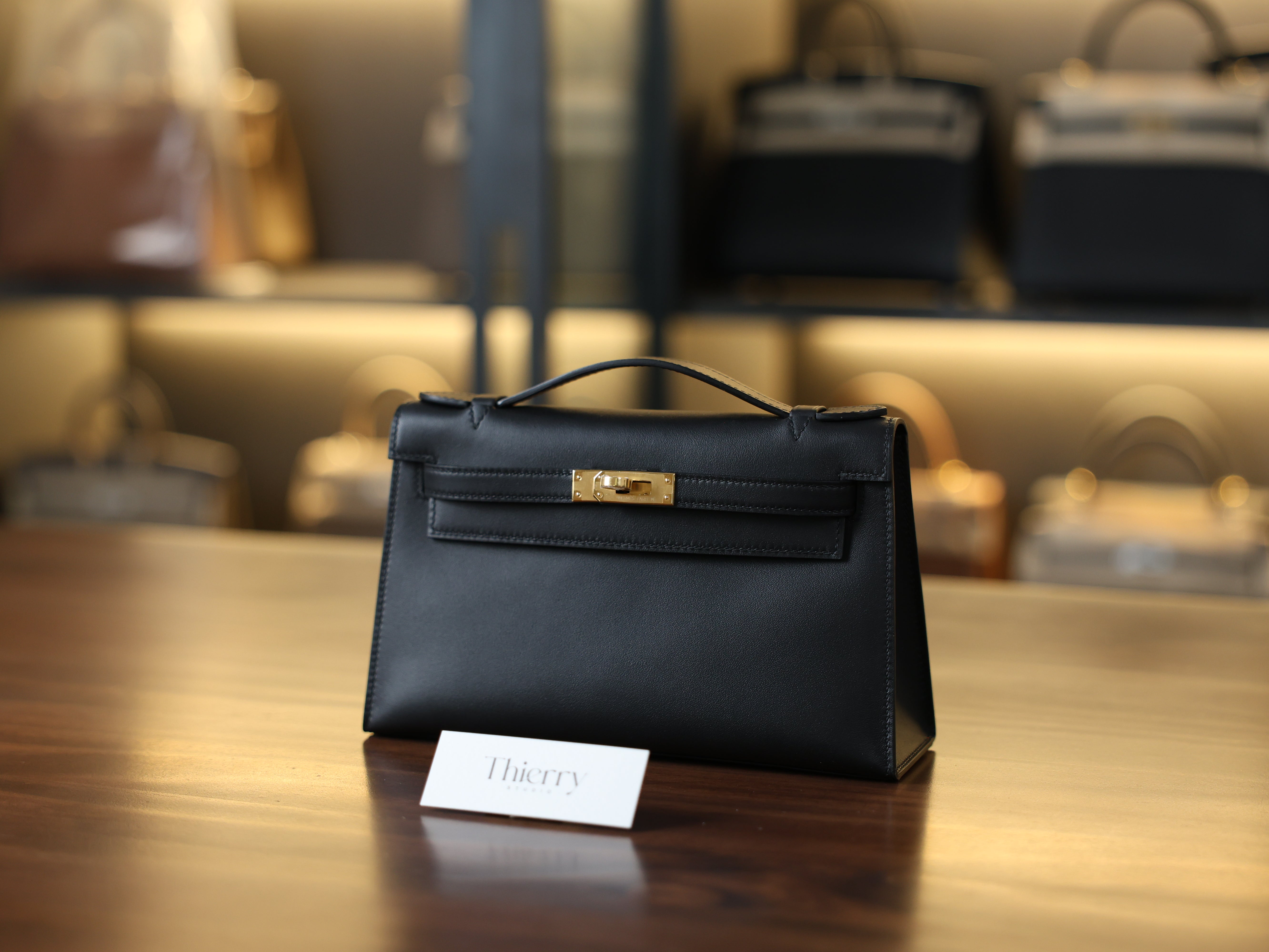 Kelly pochette swift black GHW