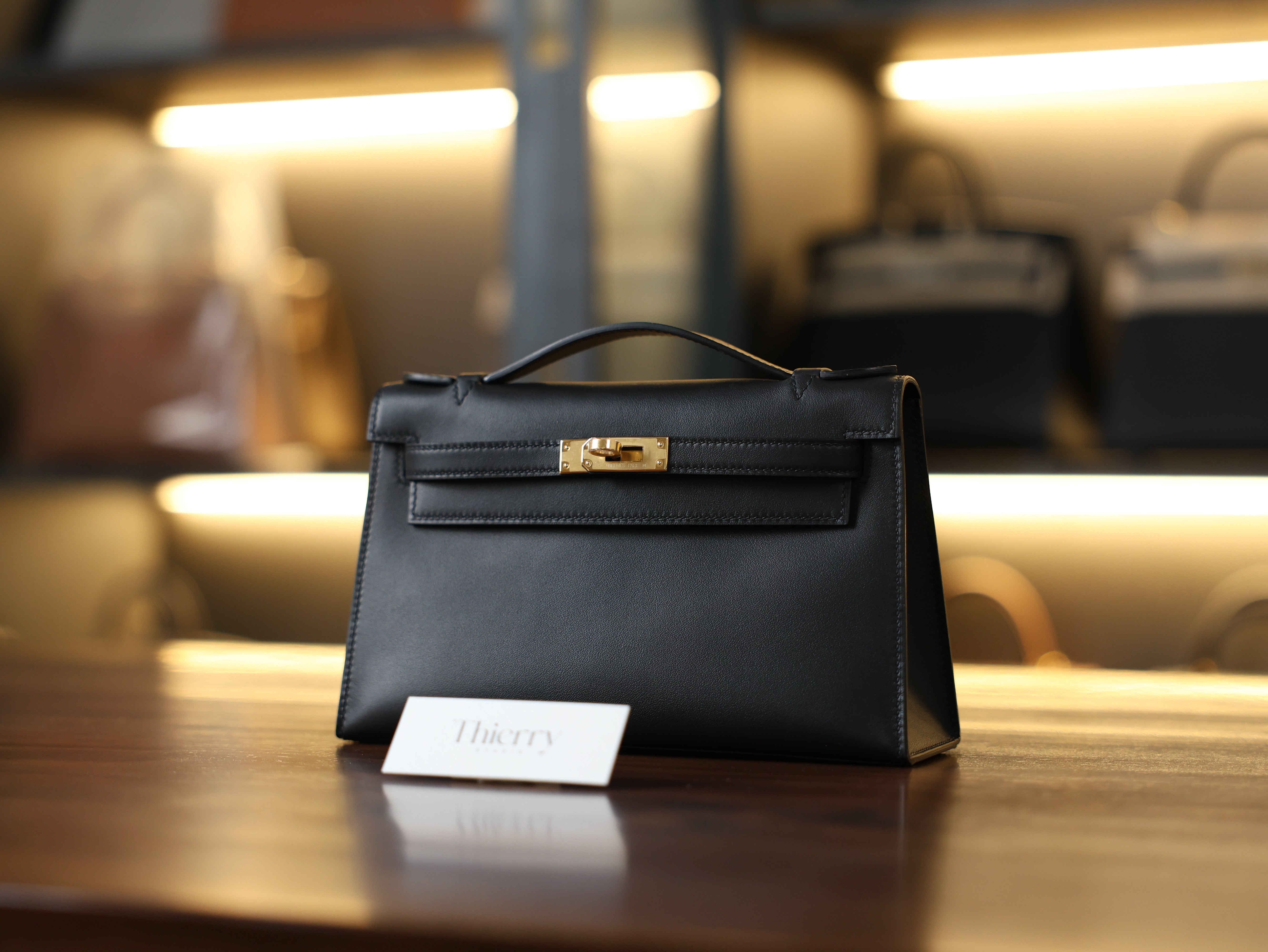 Kelly pochette swift black GHW