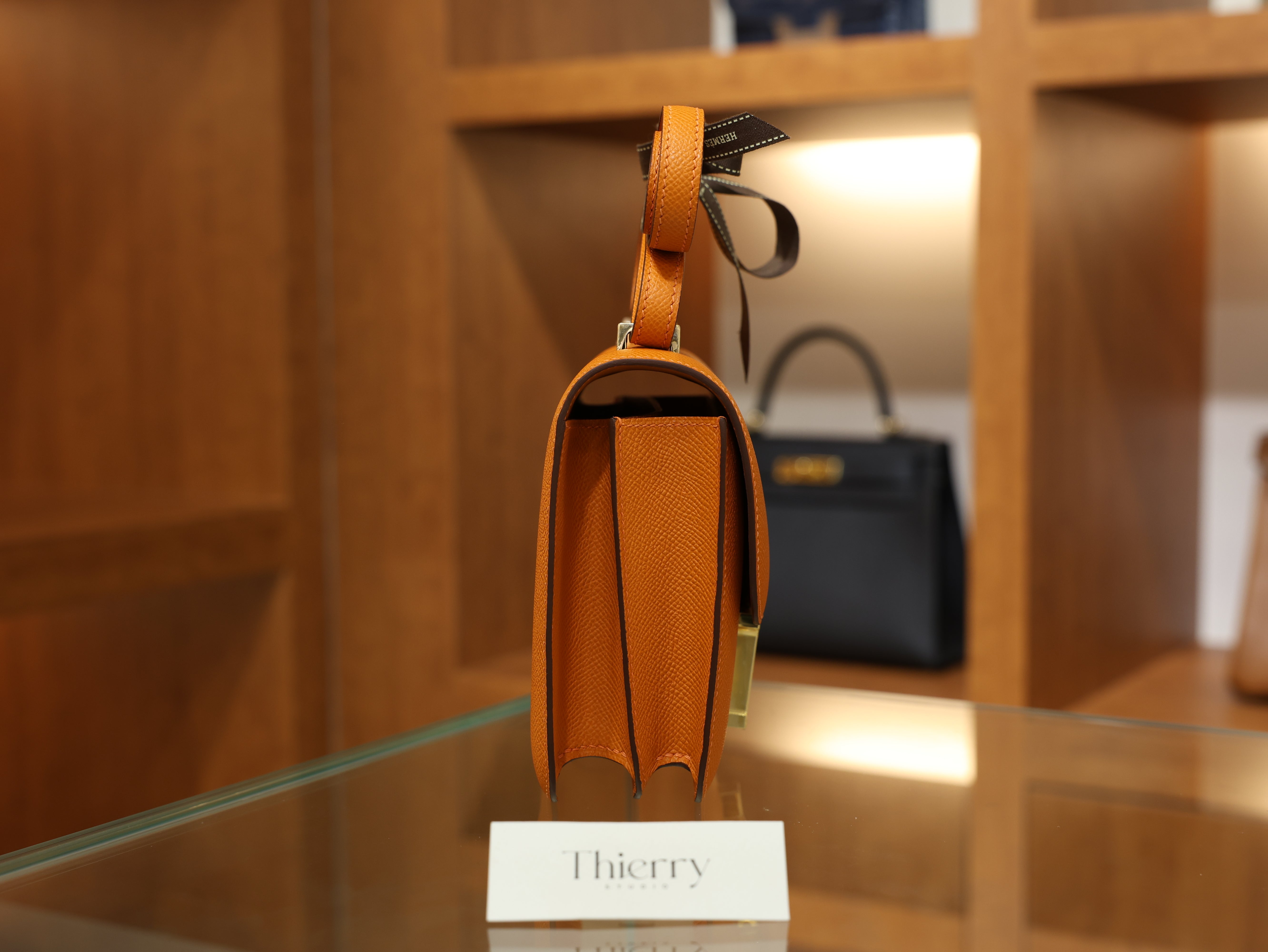 Constance 18 epsom orange GHW