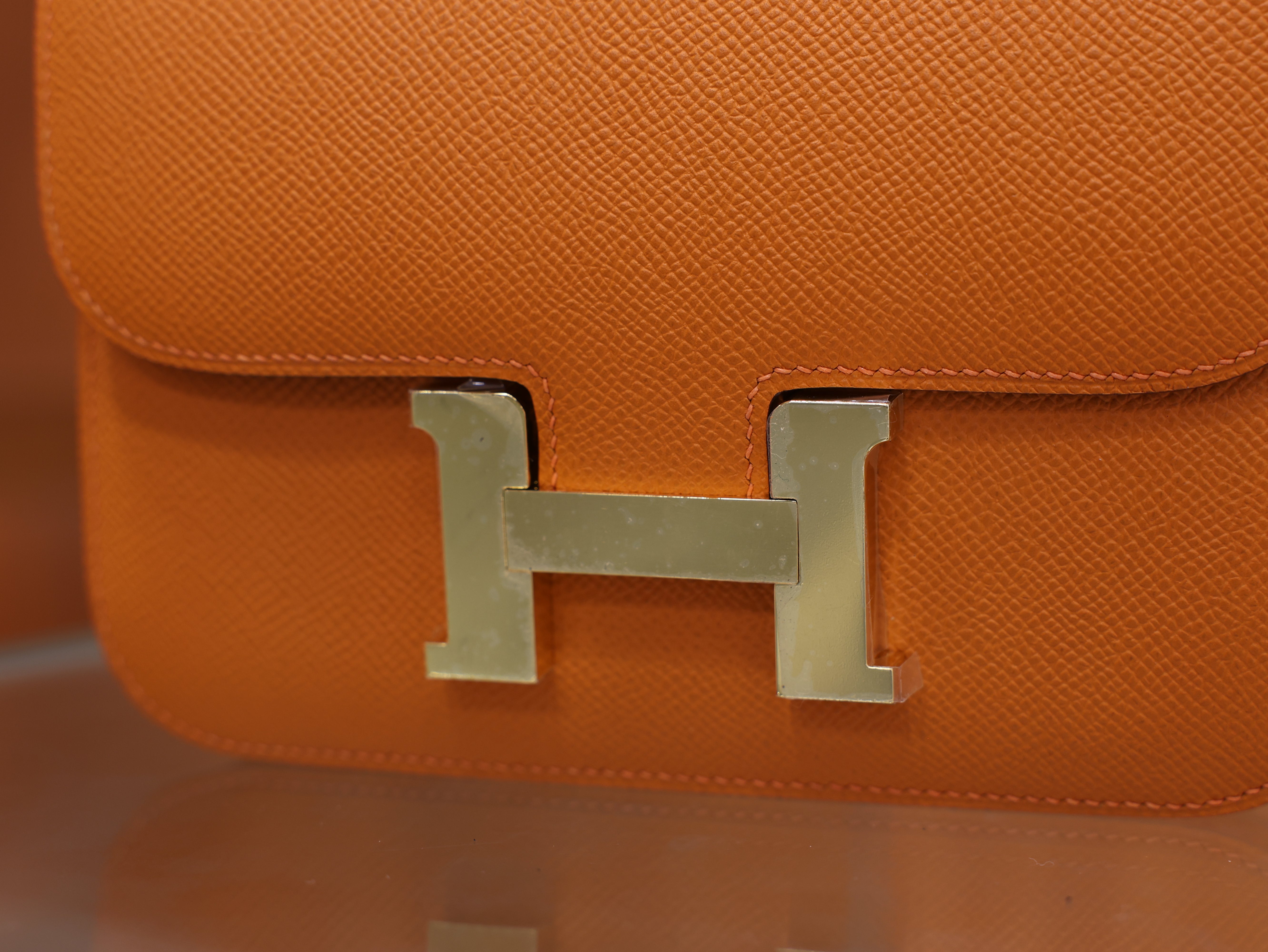 Constance 18 epsom orange GHW