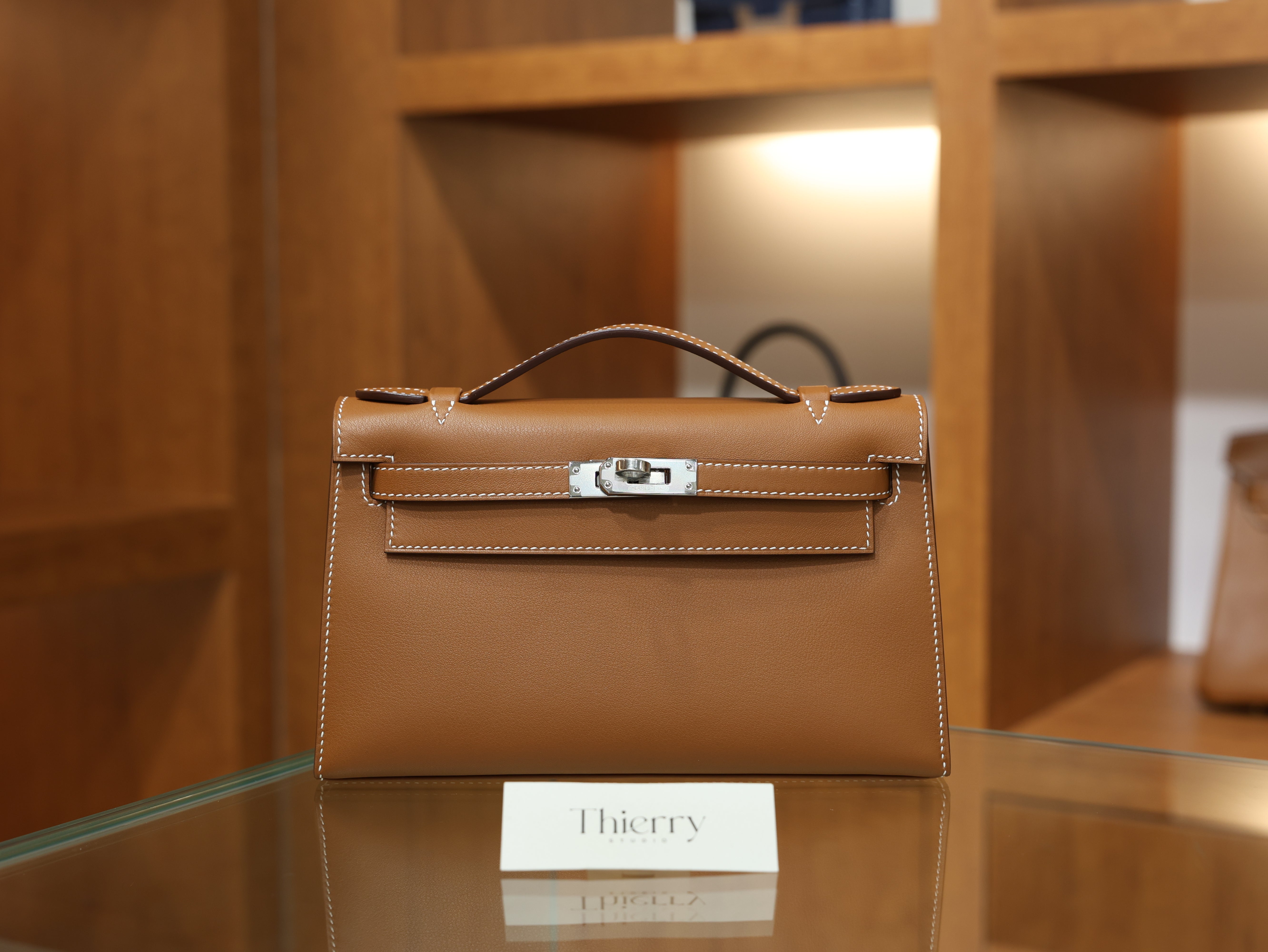 Kelly pochette swift gold PHW