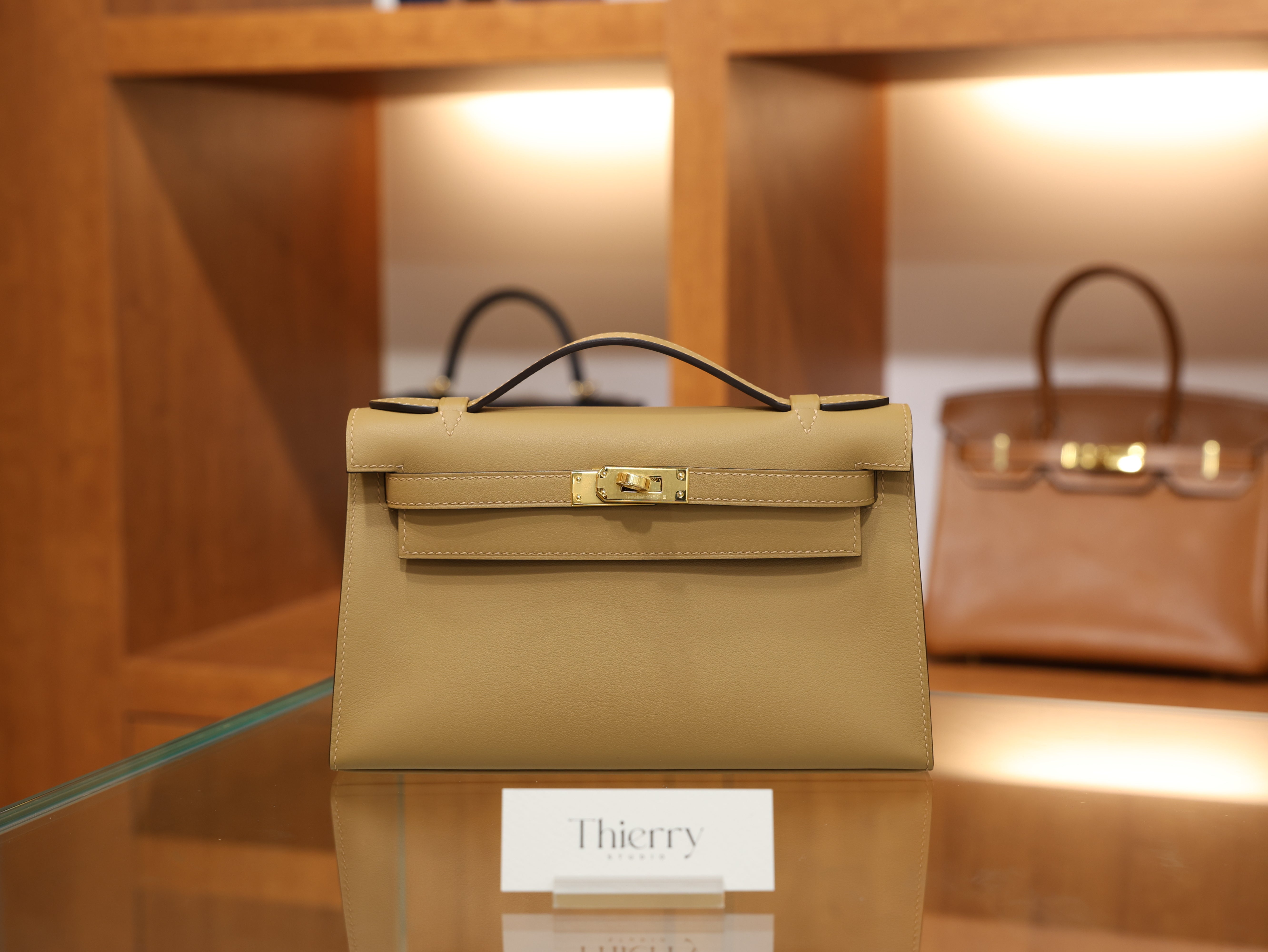 Kelly pochette swift chai GHW