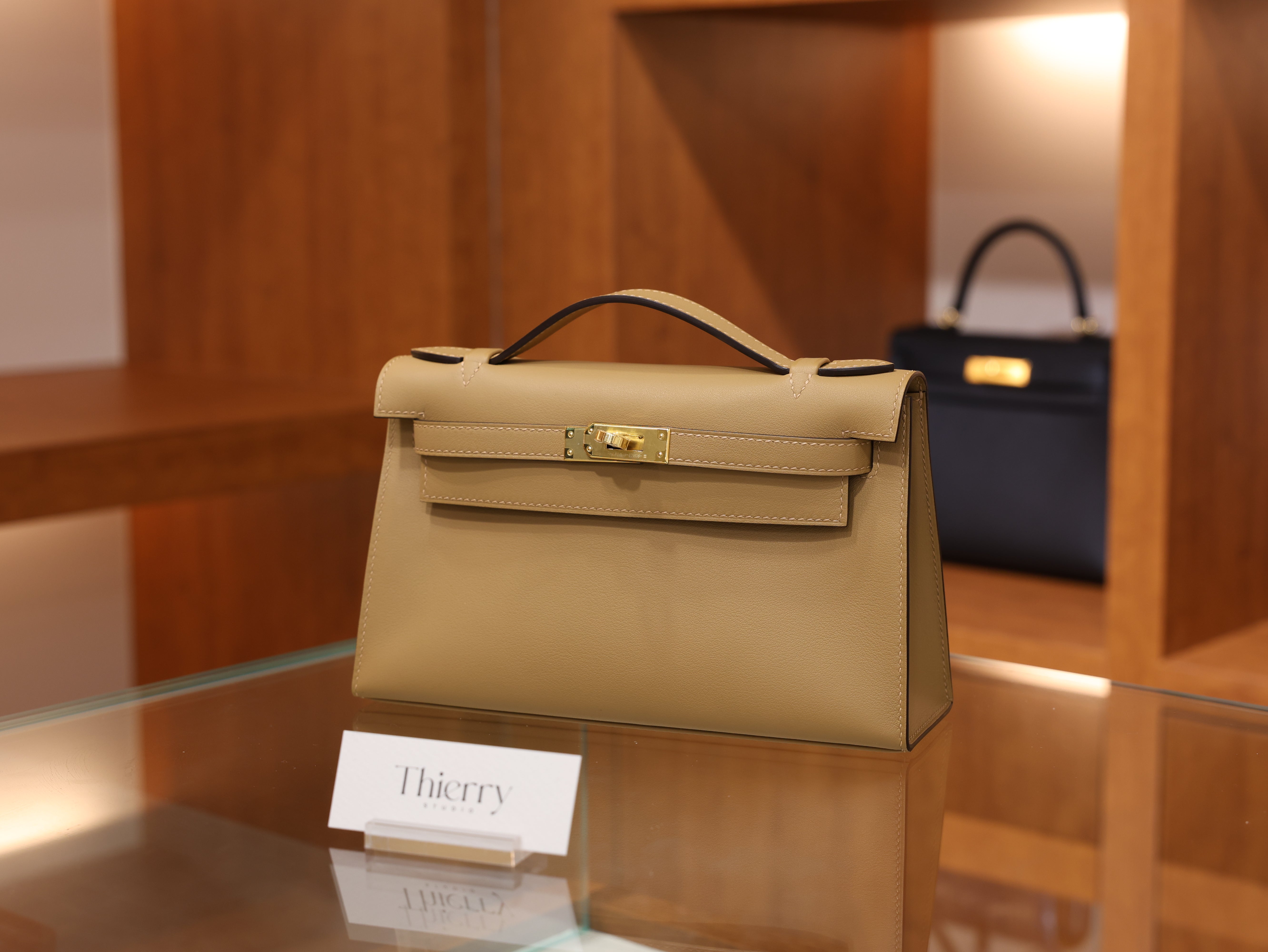 Kelly pochette swift chai GHW