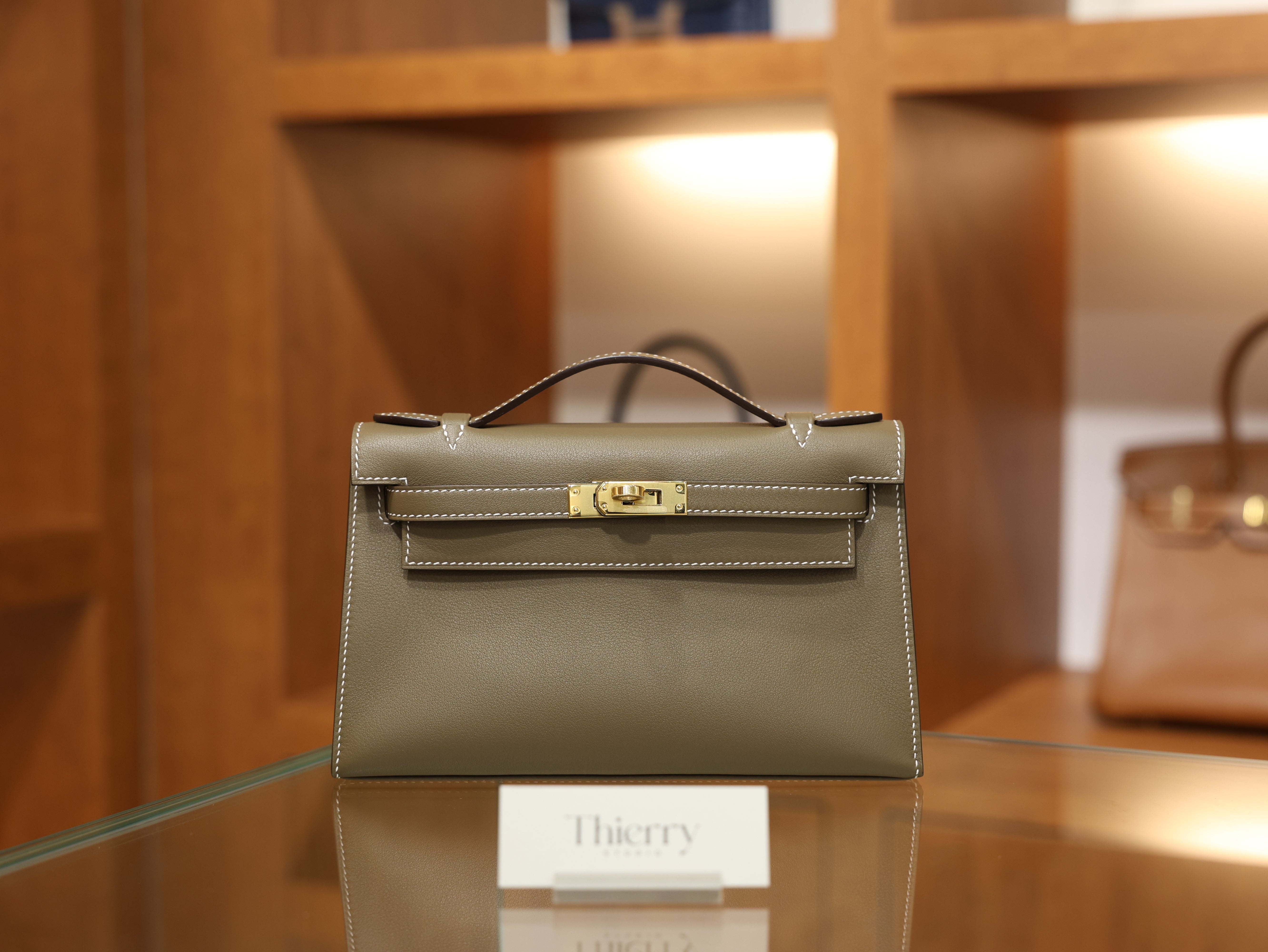 Kelly pochette swift etoupe GHW