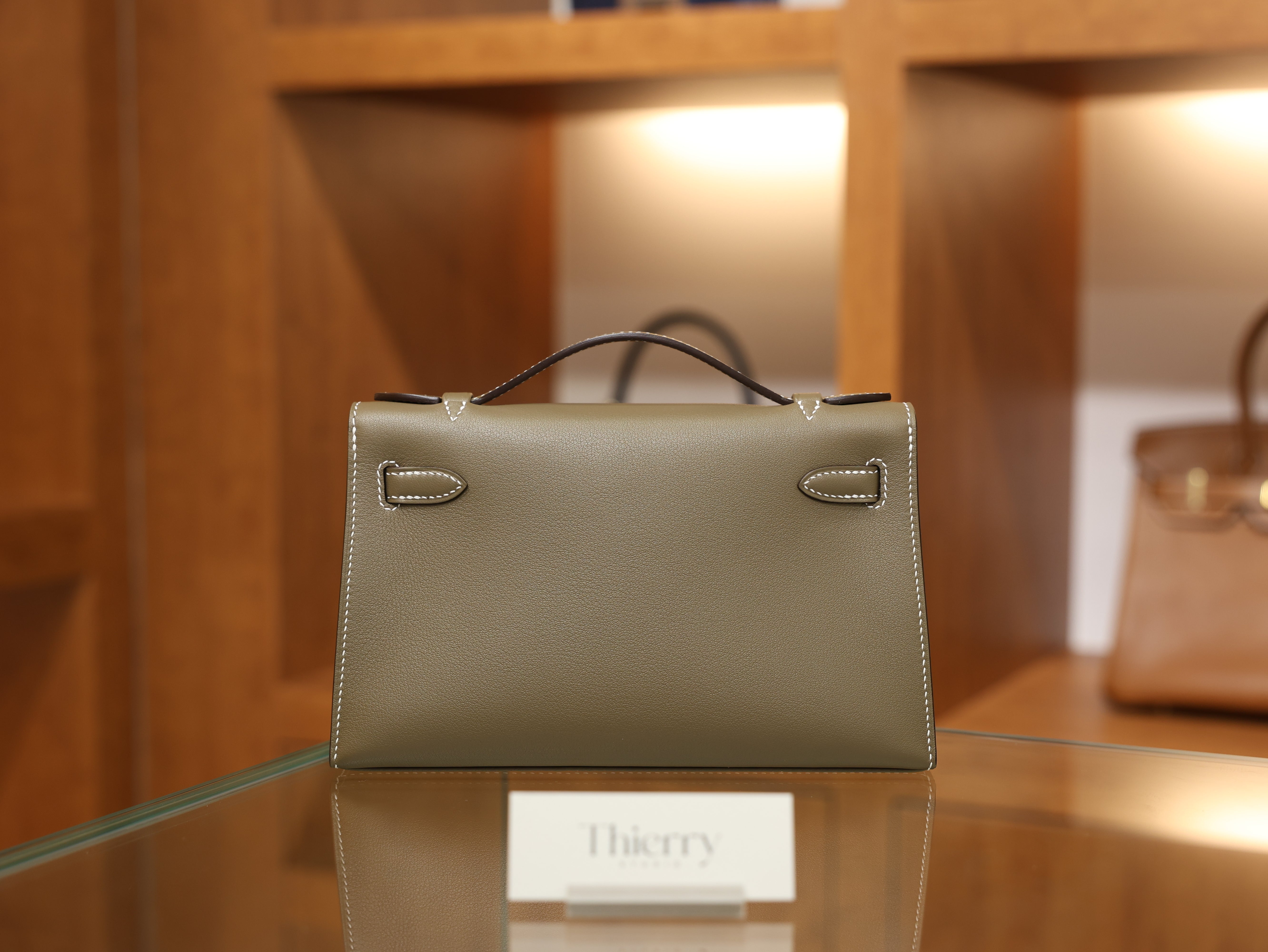 Kelly pochette swift etoupe GHW