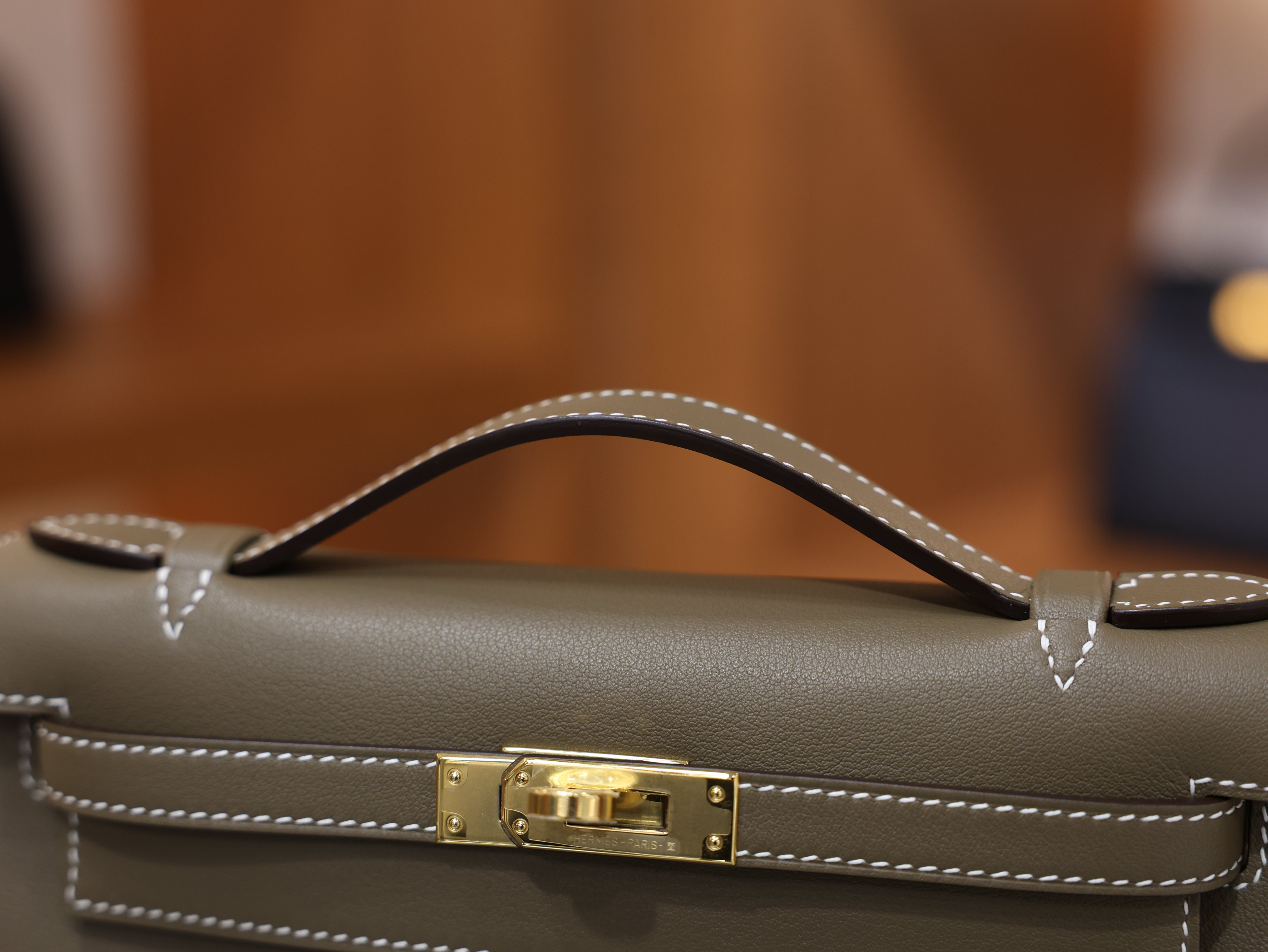 Kelly pochette swift etoupe GHW