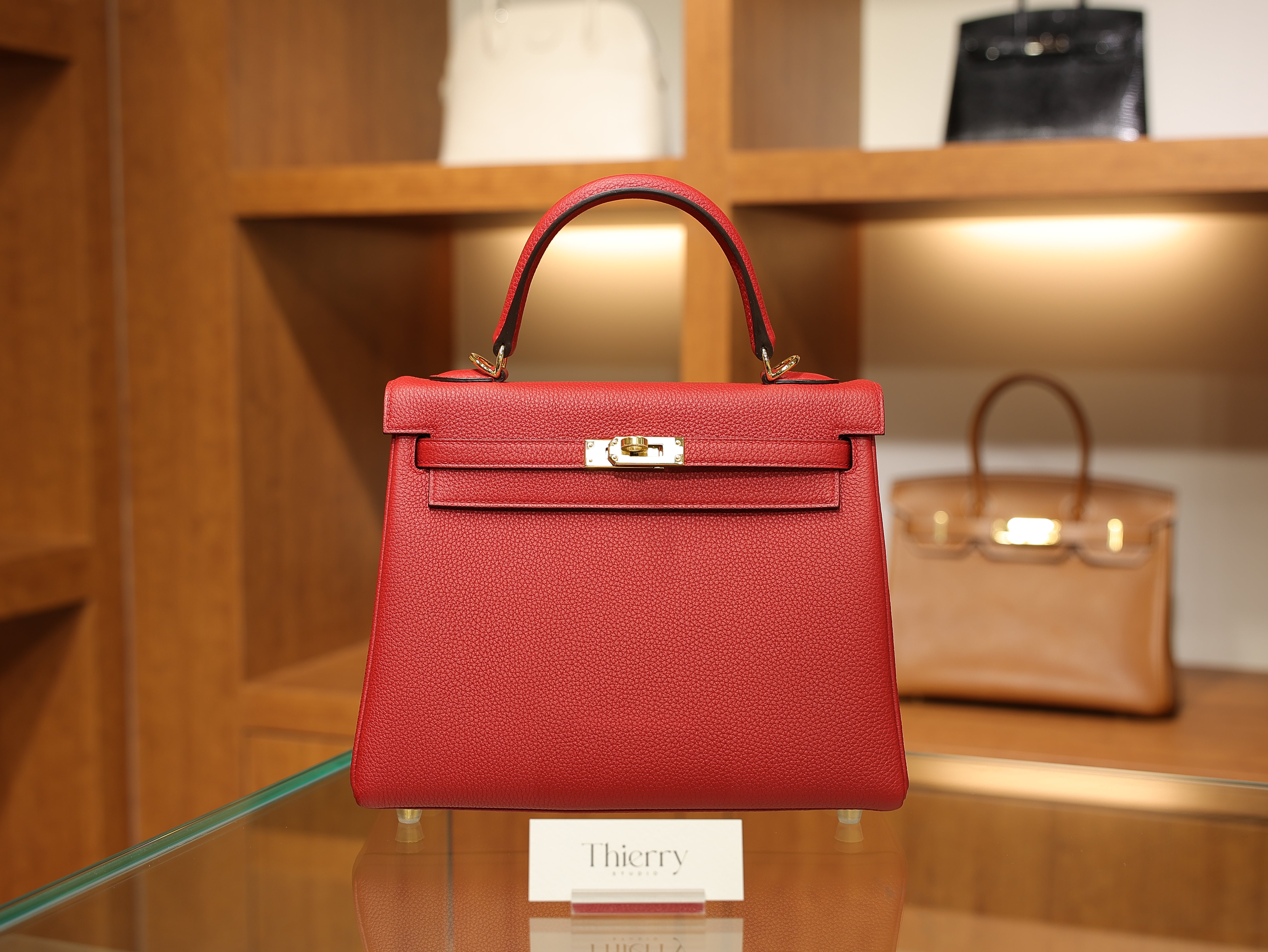 Kelly 25 togo rouge casaque GHW