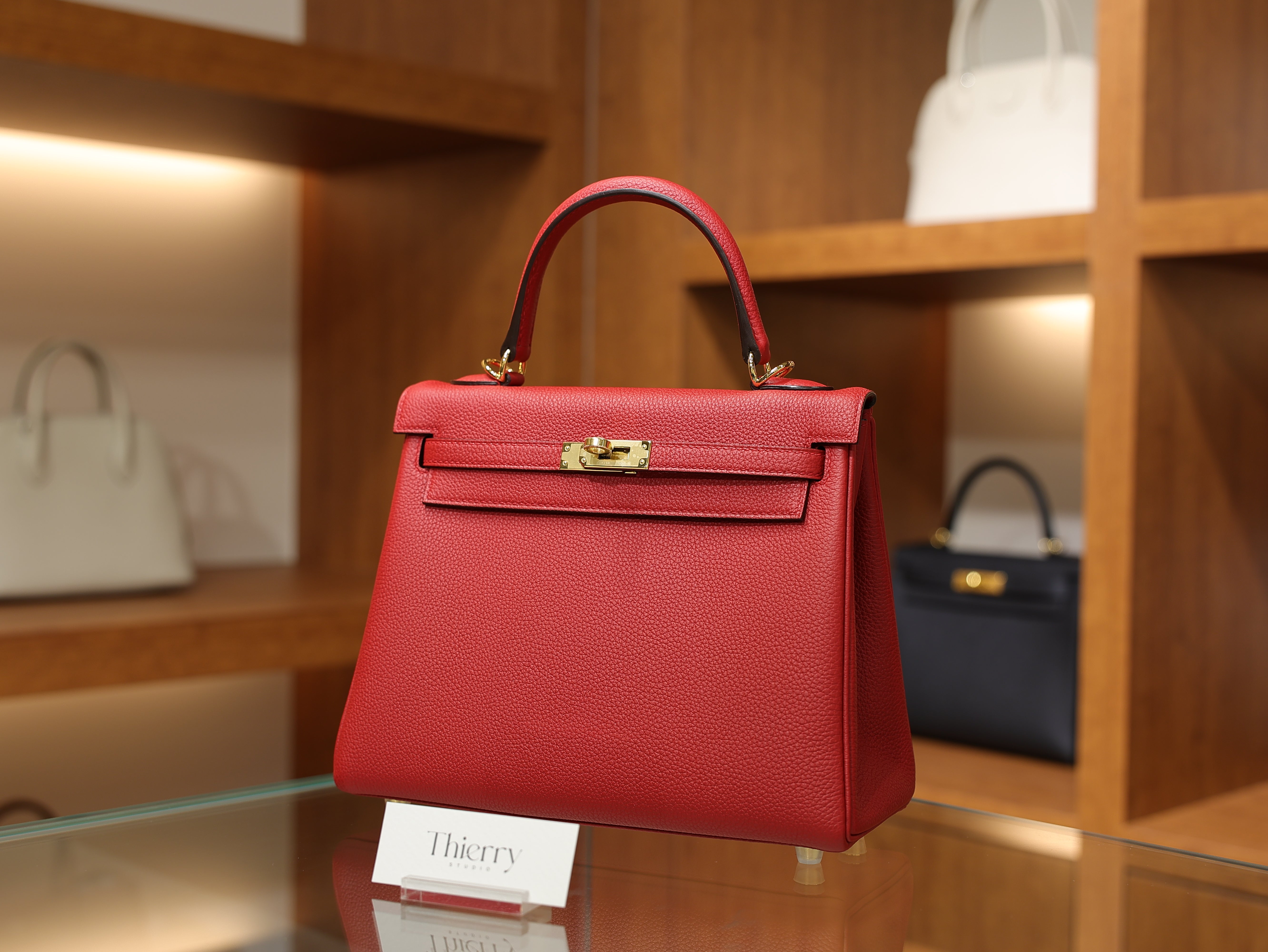 Kelly 25 togo rouge casaque GHW