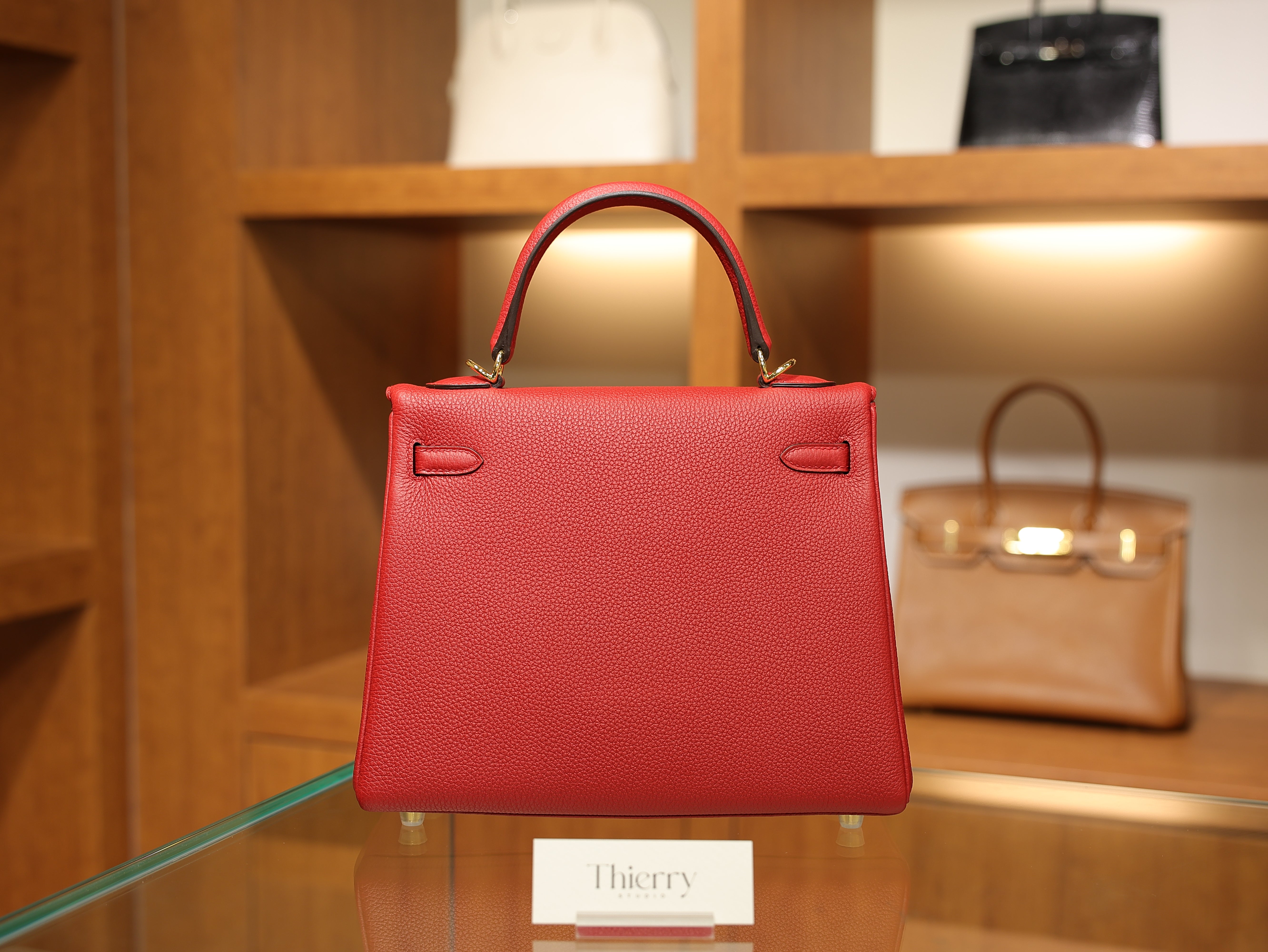 Kelly 25 togo rouge casaque GHW