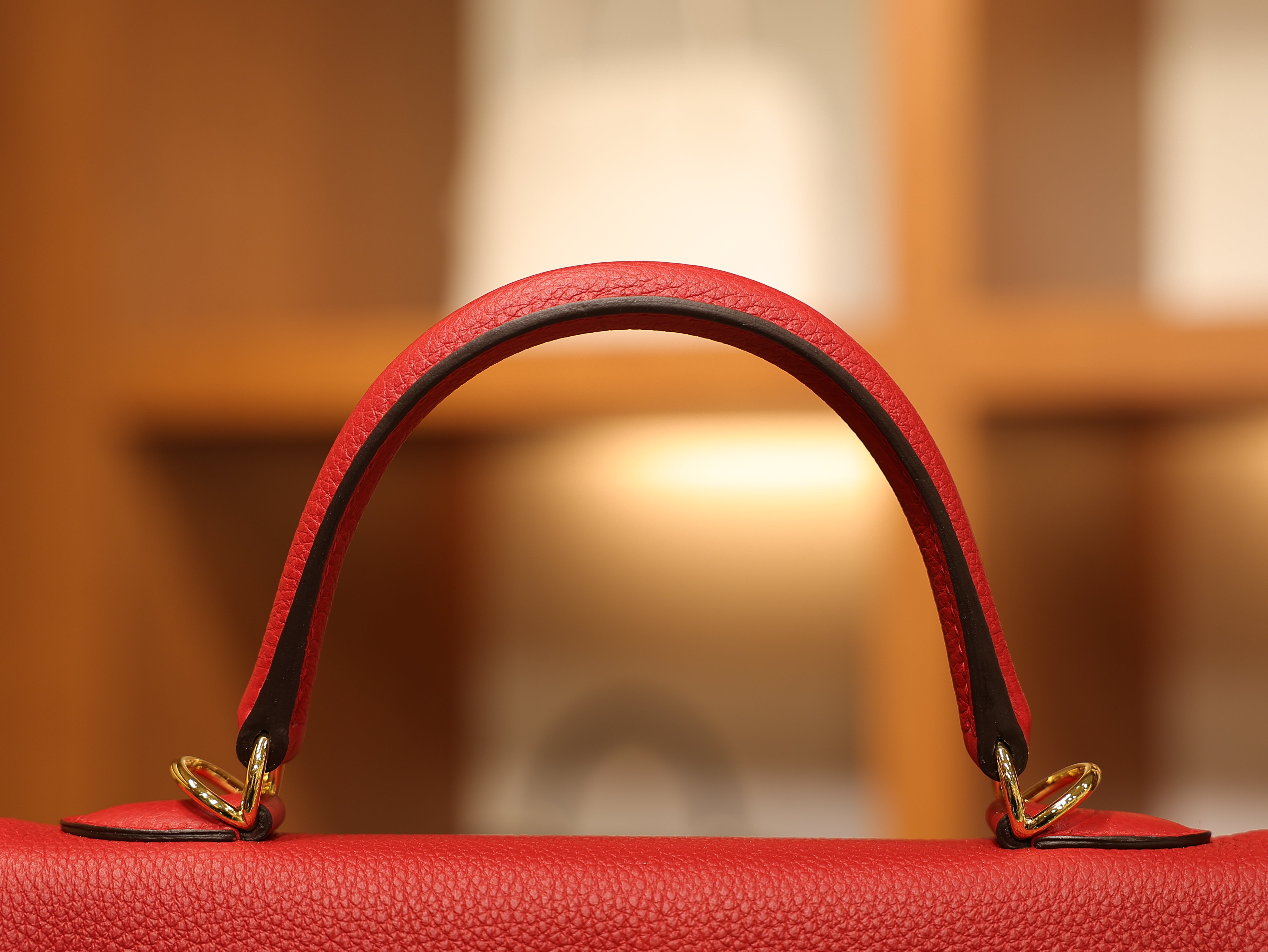 Kelly 25 togo rouge casaque GHW